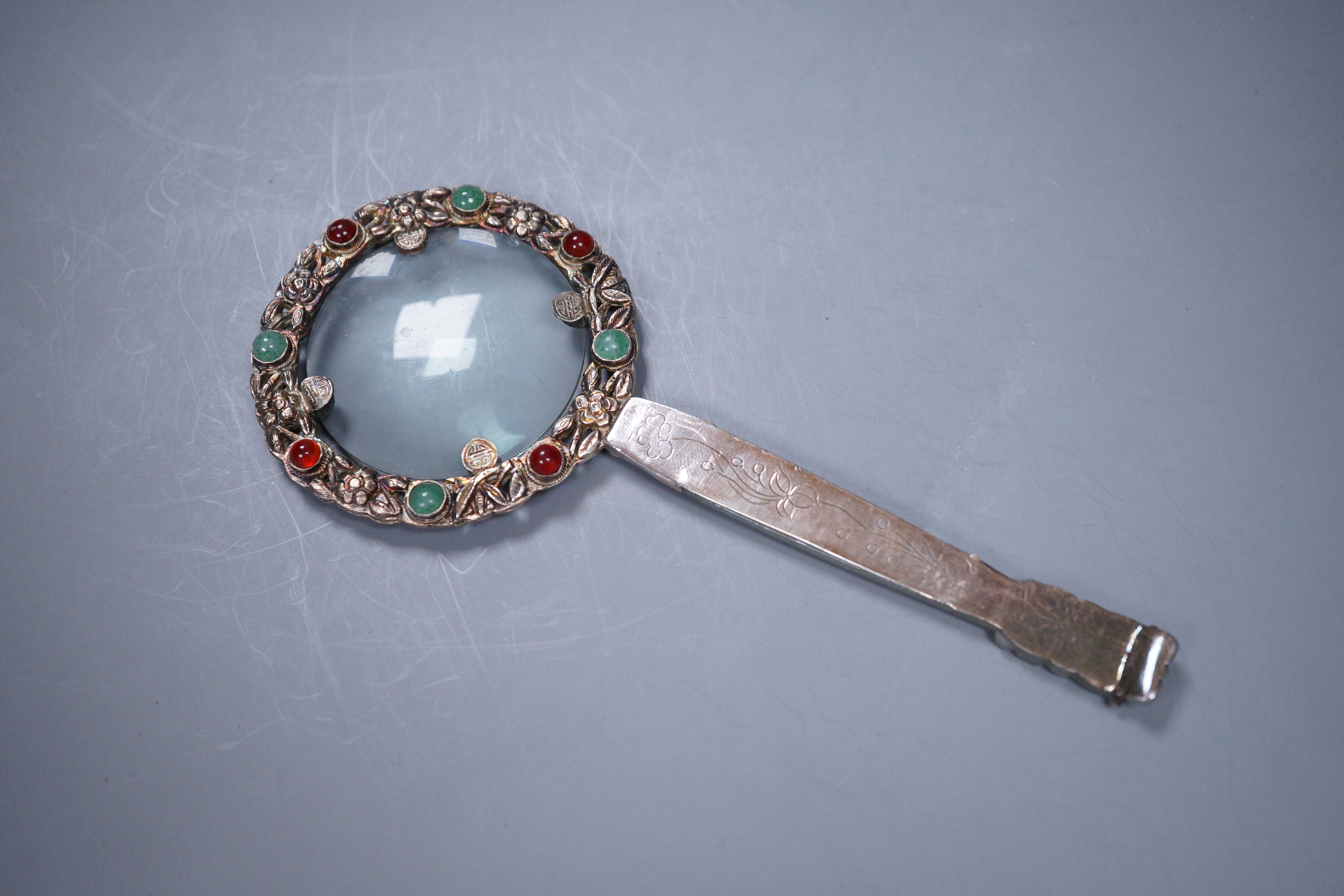 A Chinese jade mounted magnifying glass, 16.5cm